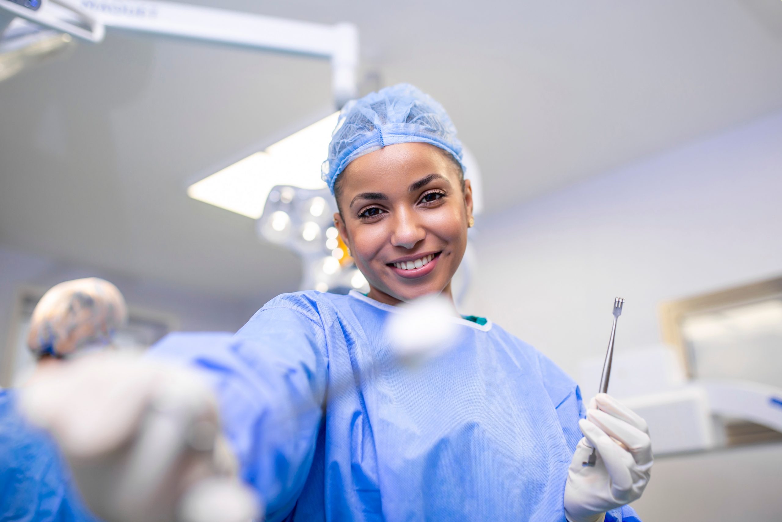 Portrait,Of,Happy,Woman,Surgeon,Standing,In,Operating,Room,,Ready